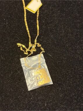 Gold Pendant Necklace with Black Detail